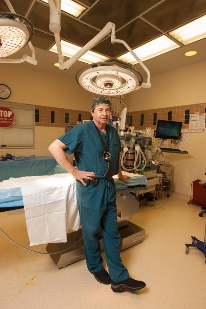 Dr. Don Penney poses in a Wyoming Medical Center operating room (Photo by Dan Cepeda Photography)